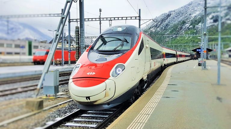 An Astoro train on the Geneve to Milan route calls in Brig station